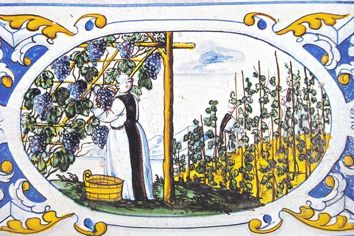 Mönch bei der Weinlese, Motiv auf dem Kachelofen im Sommerrefektorium von Salem